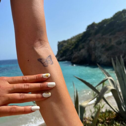 Tijdelijke vlinder tatoeage