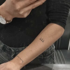Tijdelijke tattoo Angel numbers 777 sfeer