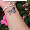 Temporary tattoo butterfly flowers placement